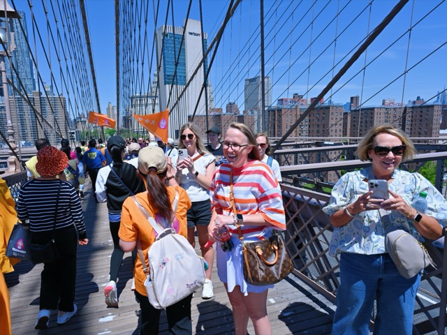 Smiles along the Brooklyn Bridge promenade